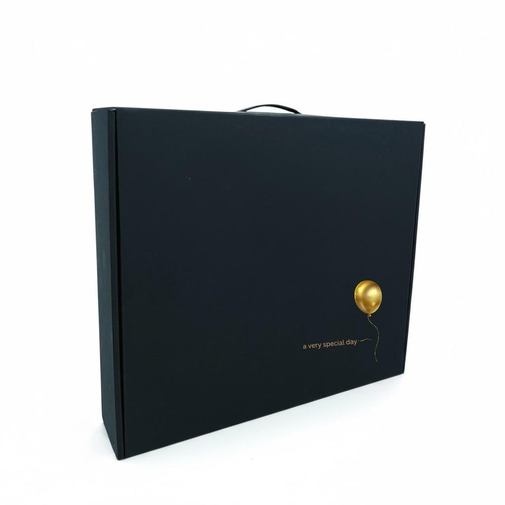 Black gift box with a Happy Birthday 3D sticker